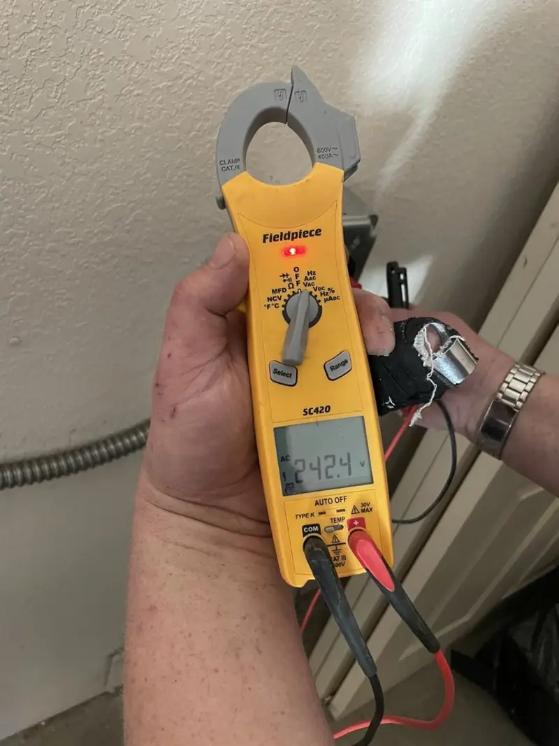 Voltage testing with clamp meter during Hot Tub / Pool Electrical Wiring in Grand Mound